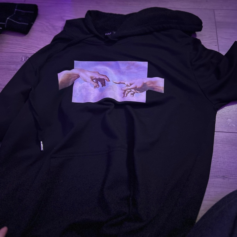 Black Hoodie with Artistic Graphic
